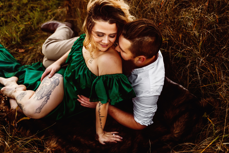 Family Photography, Man and woman cuddles up, woman wearing green dress